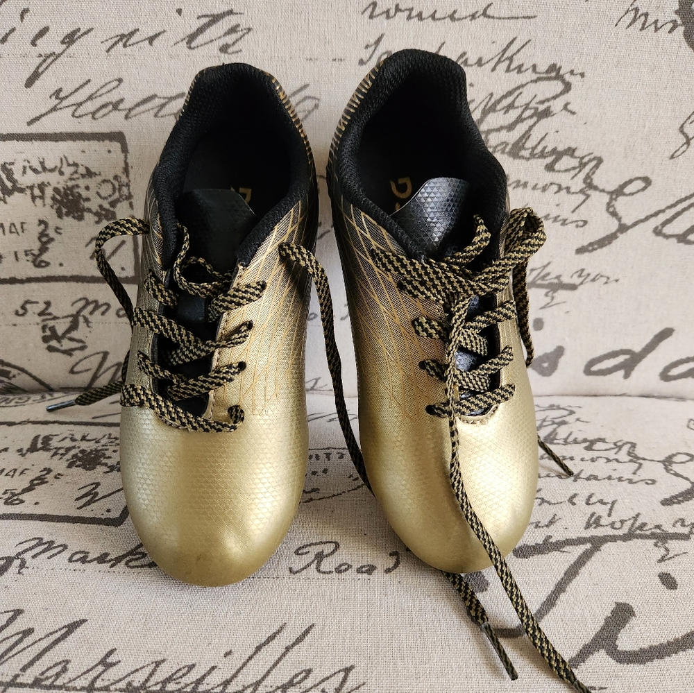 Kids cleats gold